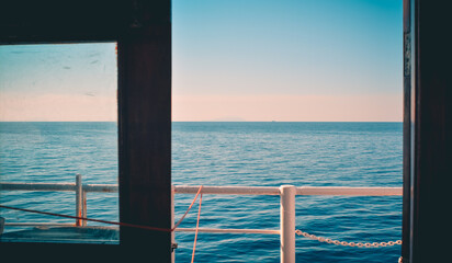 sunset over the sea, view from the window