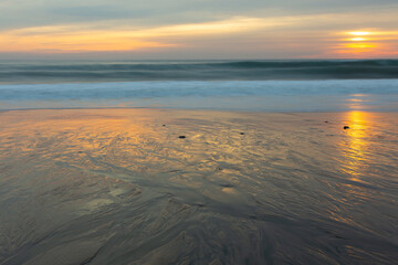 Unique sand texture at the beach during sunset