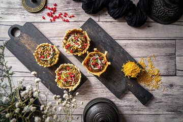 Old Dilli Katori Chaat served in a dish isolated on dark background top view food - obrazy, fototapety, plakaty