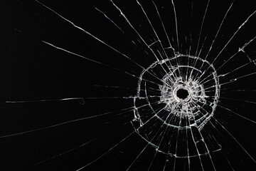 bullet hole on glass black background for overlay, transparent window