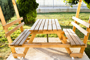 Wooden seats used for park and open spaces. Camellia