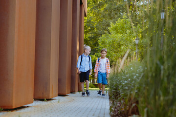 children walking to school. Begining of academic year