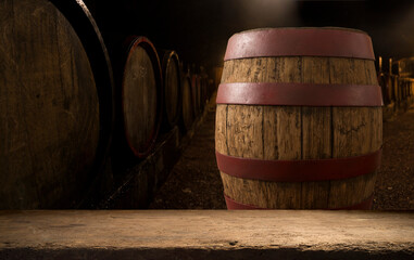 Old wooden barrel on a brown background