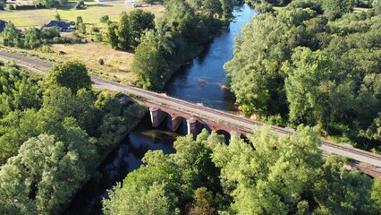 Fototapeta na wymiar view of a river and bridge in Żagań 