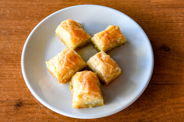Turkish Dessert Sobiyet  Baklava, mussels baklava and classic baklava with Pistachio . Cevizli, Fistikli Baklava, top view.