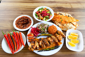 Chicken wings barbeque in a dish with BBQ grill sauce . Izgara tavuk kelebek sis kanat. Tavuk sis, gogus.