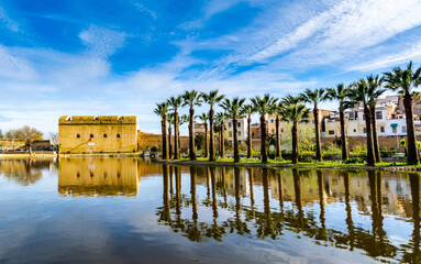 Beautiful Jnan Sbil or Bou Jeloud garden, Royal Park in Fez with lake and palms. Location: Fez,...
