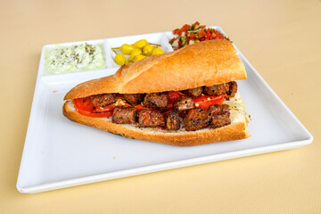 Meatball between bread (Turkish name : ekmek arasi kofte ) Izgara kofte. Manisa, Akcaabat, Akhisar  kofte