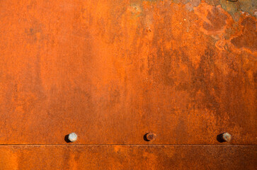 Grunge rusty metal texture with rivets background with space for text or image