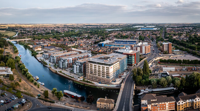 Aerial view of the River Nene and luxury waterfront apartments in Peterborough 