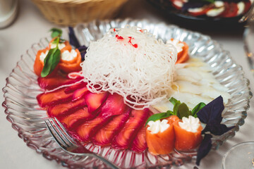 Catering table, beautifully decorated banquet with variety selection of different food snacks and appetizers on a corporate birthday party event or wedding celebration, delicatessen setting