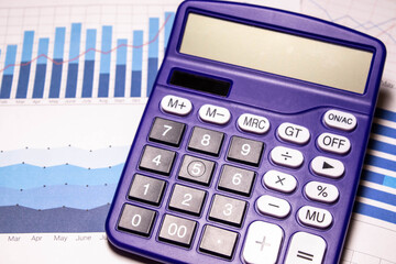 Blue digital calculator on the top view white background