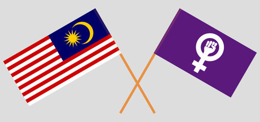 Crossed flags of Malaysia and Feminism. Official colors. Correct proportion