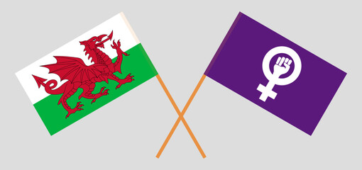 Crossed flags of Wales and Feminism. Official colors. Correct proportion