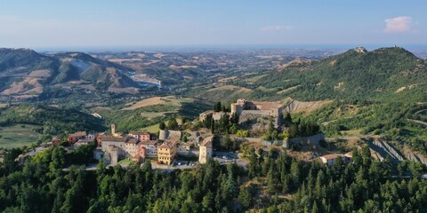 Fototapeta na wymiar aerial view of Montebello village and his castle also named Azzurrina castle. Poggio Torriana, Emilia Romagna, Italy