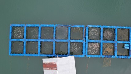 Fototapeta na wymiar Aerial View of Fish Farms in Norway