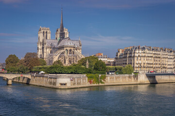 Notre Dame Cathedral of Paris and Seine river at sunny day, France