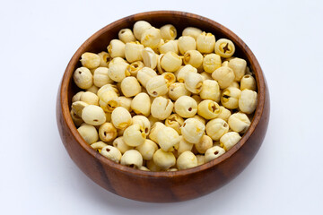 Dried lotus seeds on white background.