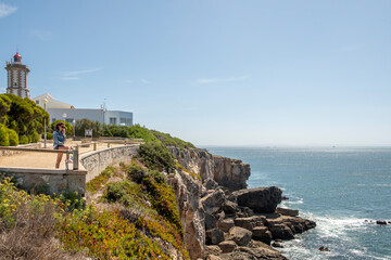 Nice brownstone cliffs on the Portuguese Atlantic coast on a warm summer day with the breeze on the...