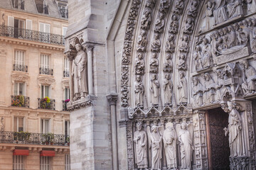 Fototapeta na wymiar Notre Dame of Paris last judgment ornate facade details, France