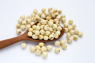 Dried lotus seeds on white background.