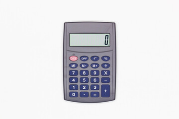 Calculator with big blue buttons and zero on the digital screen on a white background. Solar powered calculator. Electronic machine for math calculations. Business office supplies. Isolated. Close-Up