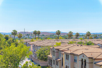 Obraz premium Clay tile roofs of residential flat buildings at Ladera Ranch in California