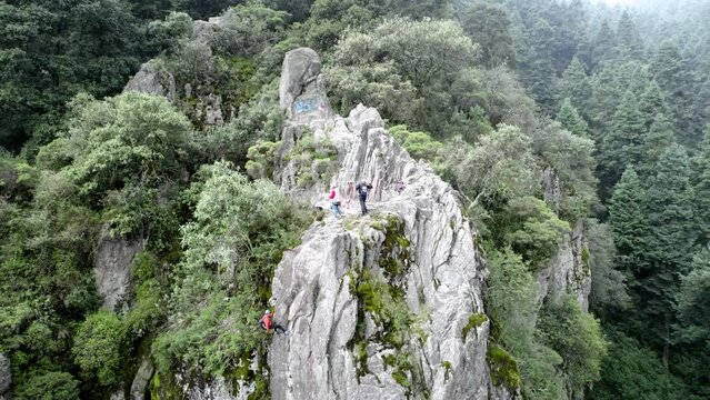 drone shot of team climbers descending the mountain south of mexico city