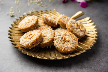 Amrit peda or Amrut pedha or pera is an Indian sweet made from milk and sugar with coconut topping