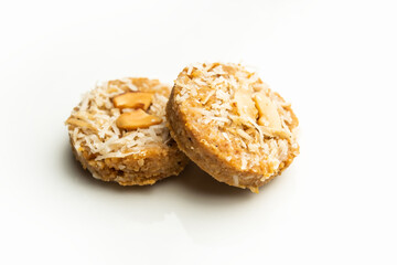 Amrit peda or Amrut pedha or pera is an Indian sweet made from milk and sugar with coconut topping