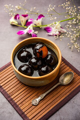 Chocolate dipped gulab jamun, indian creative fusion dessert food