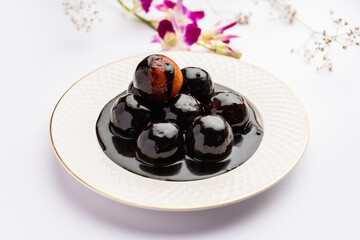 Chocolate dipped gulab jamun, indian creative fusion dessert food