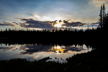 Fototapeta premium Morning reflection at flower lake in mountains