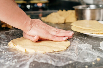 Woman's hands making homemade arepas