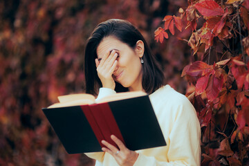 Woman Reading a Stupid Conspiracy book making Facepalm Gesture. Educated girl finding scientifical...