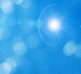 Abstract blurred blue background with double exposure of bokeh circle glitter