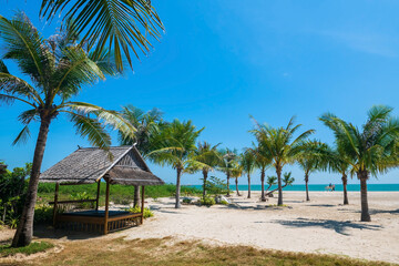 Relax cabin surrounding with coconut trees on Cha Am beach