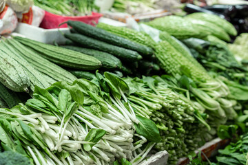 various of fresh green vegetables at the market  