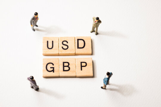 businessman figures meet USD and GBP