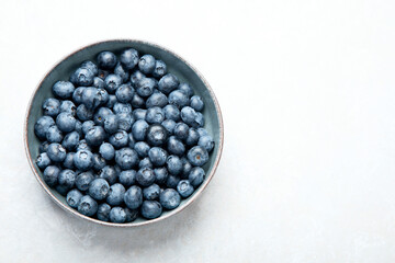 Fresh blueberry on neutral background.