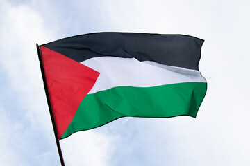 Close up view of the flag of Palestine waving in the wind