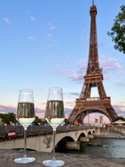 Glasses of champagne and Eiffel tower city