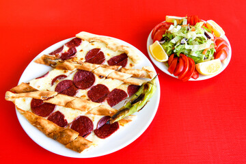 Kiymali pide. Turkish pide with minced meat. Turkish pizza mince pita Pide on white background. Etli ekmek. Kusbasi kasarli, kiymali kasarli, kiymali yumurtali, Bafra, Trabzon, Kusbasili pide.