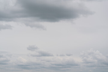 White clouds over clody sky