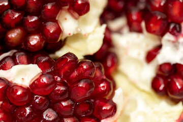 background of ripe pomegranate close-up, macro