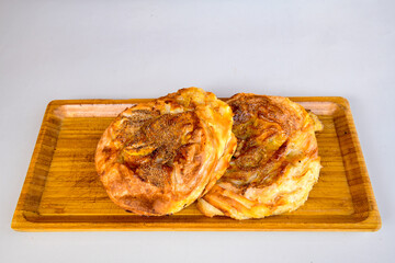 Turkish pastry product , tasty pogaca. Simit, gevrek. Turkish Pastries; peynirli, patatesli, kasarli pogaca, borek, acma, ay coregi at patisserie showcase.