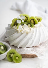 dessert Pavlova cake with kiwi