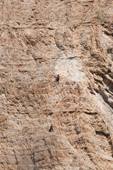 Climber in The famous three peaks of Lavaredo, in Dolomites, Italy