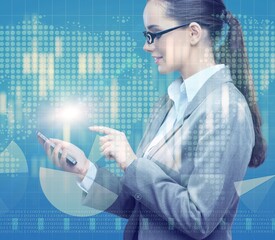 Businesswoman with mobile in business concept