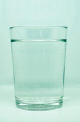 water on a transparent glass. For health concepts. Isolated white background.